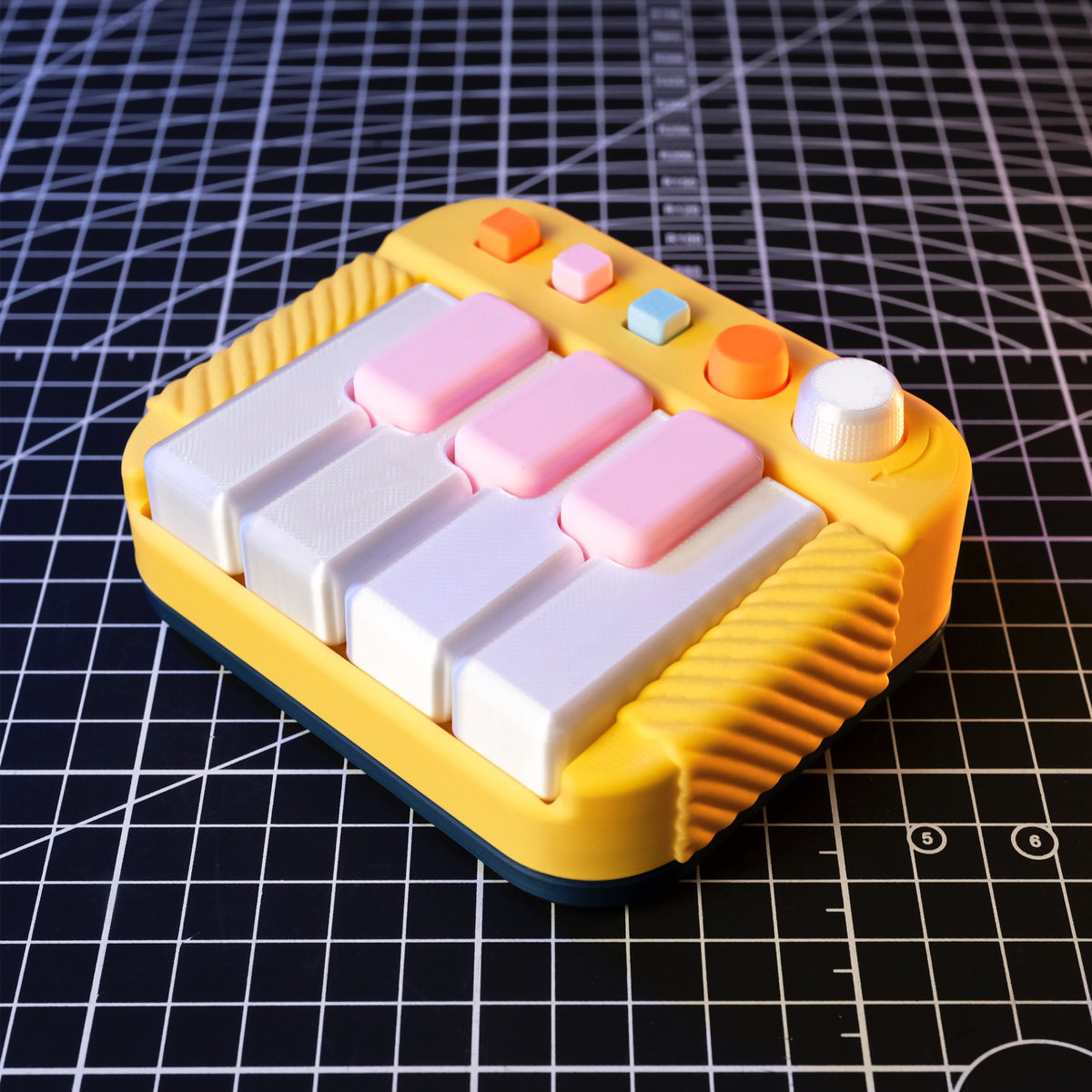 Studio Piano Clicker | Pocket Series with Light-Up Keys - Pastel Blue with Pink and Yellow - 3 Black Keys default